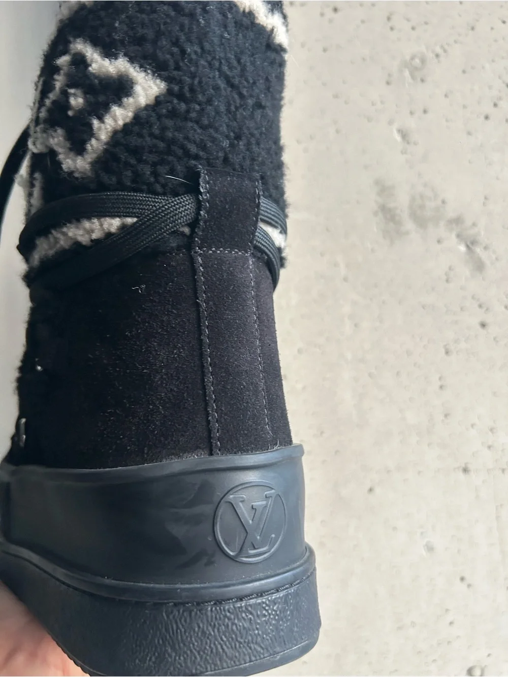 Louis Vuitton Black Knit-Trim Winter Boots with Monogram Detail.